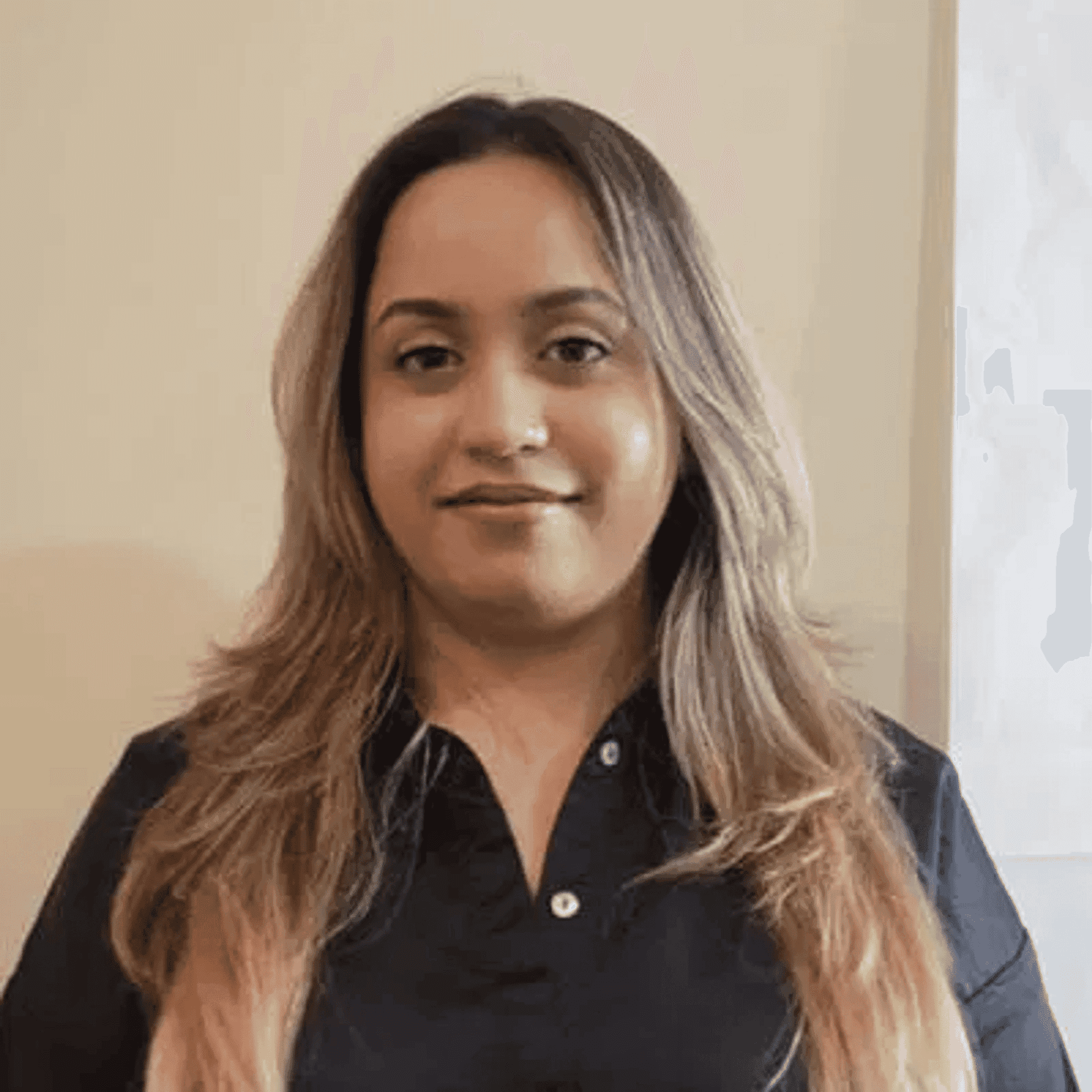 Portrait of Janvi Kapoor, a professional stylist at Royal Hair Salon, showcasing their expertise and style.